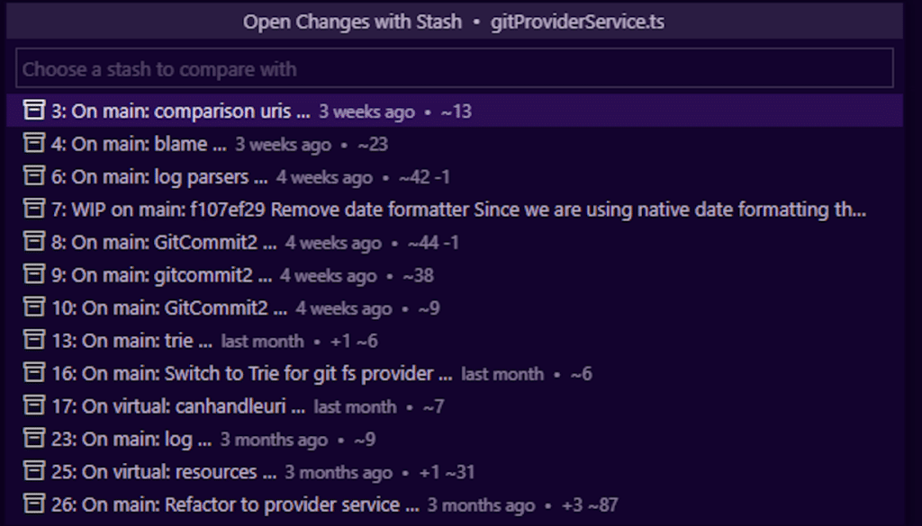 Open Changes with Revisions menu open showing stashes as selectable options.