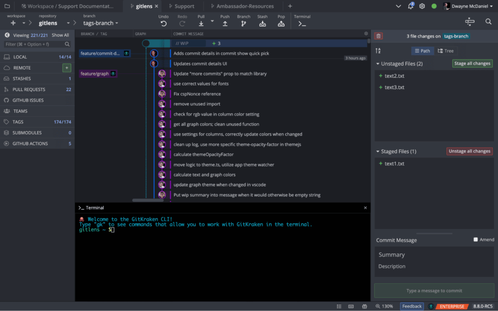 GitKraken Client with 2 modified files unstaged and 1 file staged.